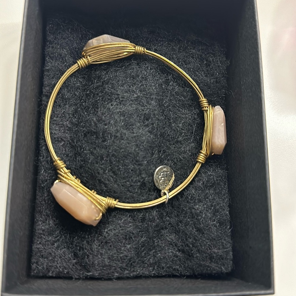 Bourbon and Bowties Pink Quartz Geode Stone Handwrapped Into A Gol. Used cond.